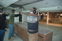 Students at the range during an S2 Alpha Pistol Skills Builder Class